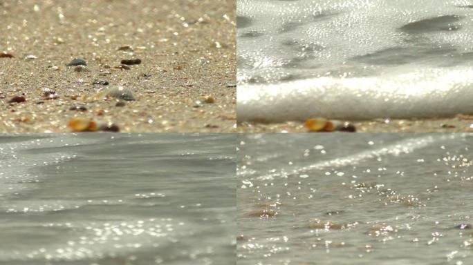 波浪拍打着沙质海岸。