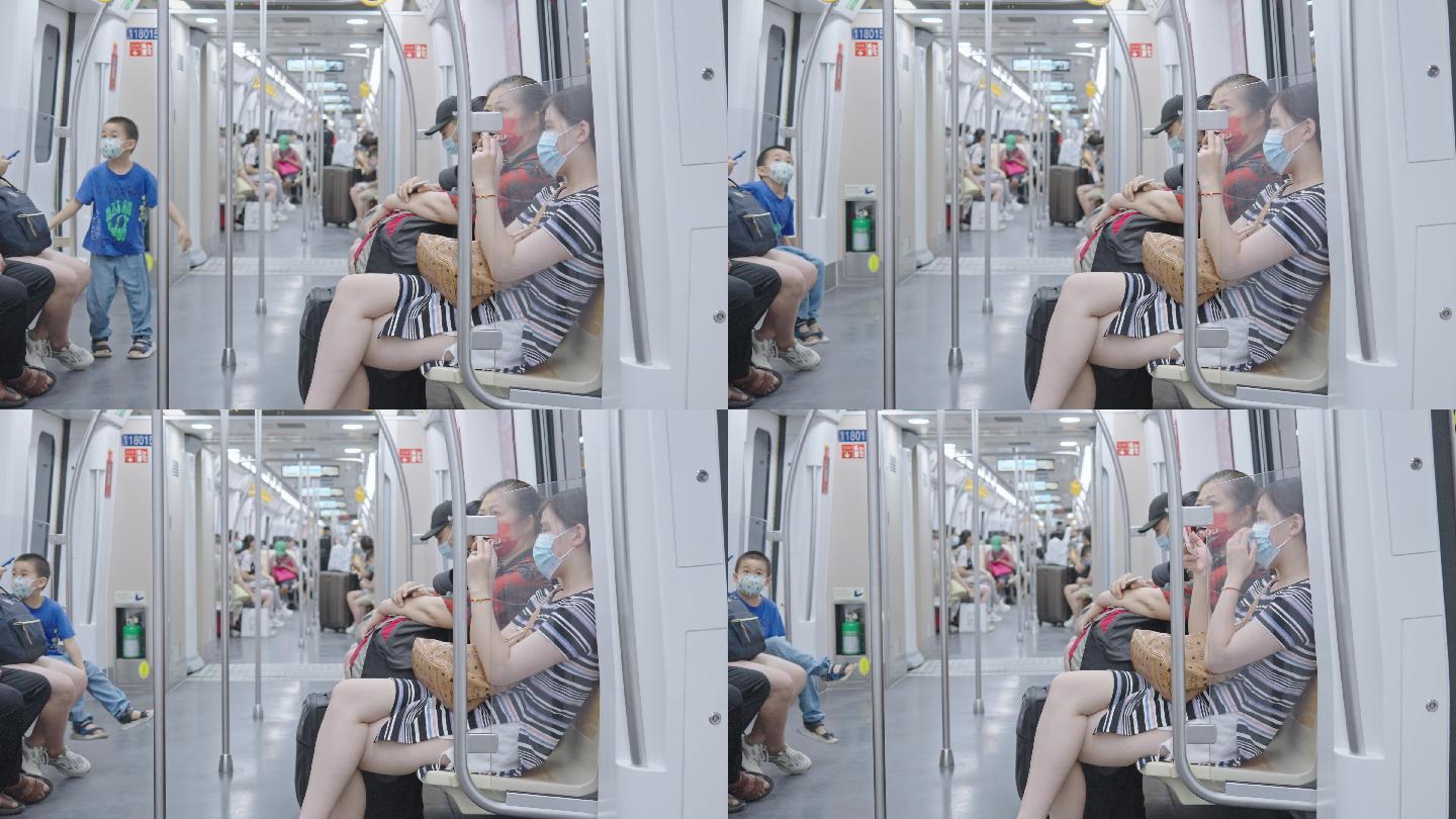 4K正版-地铁车厢内的乘客与玩耍的儿童