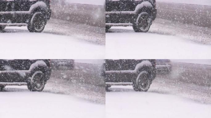 暴风雪中，汽车在湿滑的路上行驶。