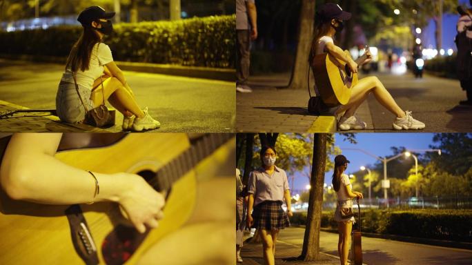 单身女生街拍夜景灯光路边一人弹吉他光斑