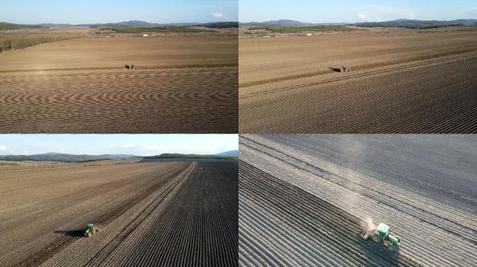 航拍东北黑土地现代化农业机械播种