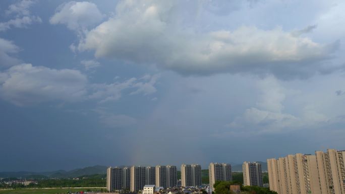 夏天午后雷阵雨云层变化延时素材彩虹