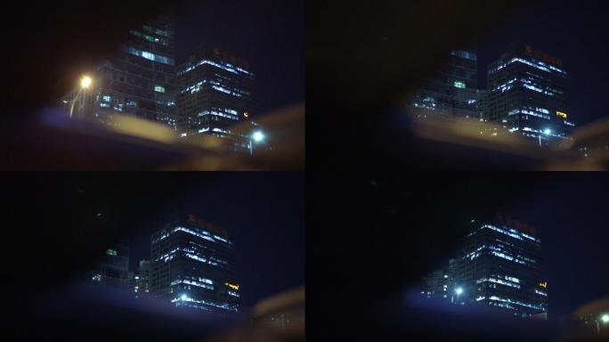 通过汽车天窗看到CBD夜景
