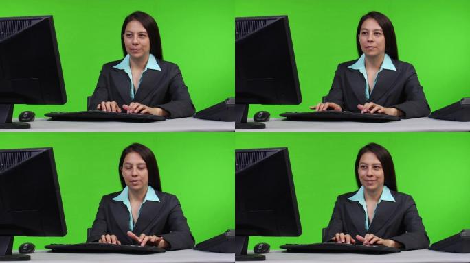 年轻女商人在电脑上打字，缩小，绿屏版---年轻女商人在电脑上打字，绿屏版