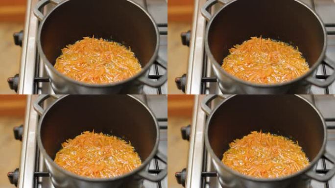 切好的胡萝卜在平底锅里烤。