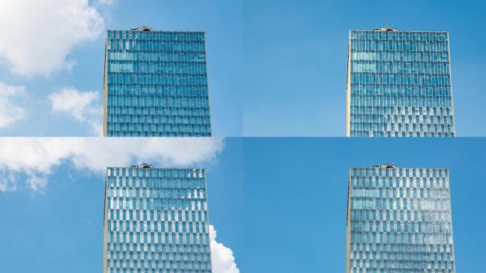 夏季晴朗的玻璃幕墙高楼大厦局部蓝天白云