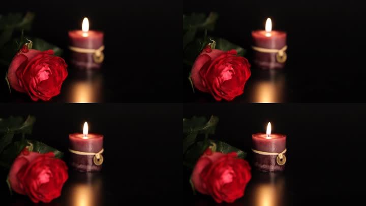 把焦点从红玫瑰转移到蜡烛上。