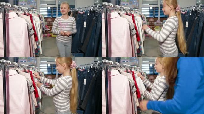 母亲和女儿在服装店挑选衣服