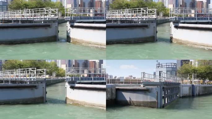 两张照片显示，芝加哥河河口的闸门打开，让水流入芝加哥港