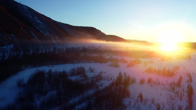 航拍大兴安岭雪野日出