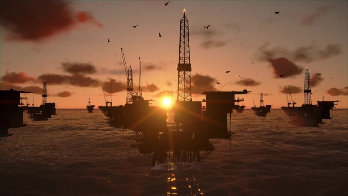 海洋中的石油钻塔，永恒的日落