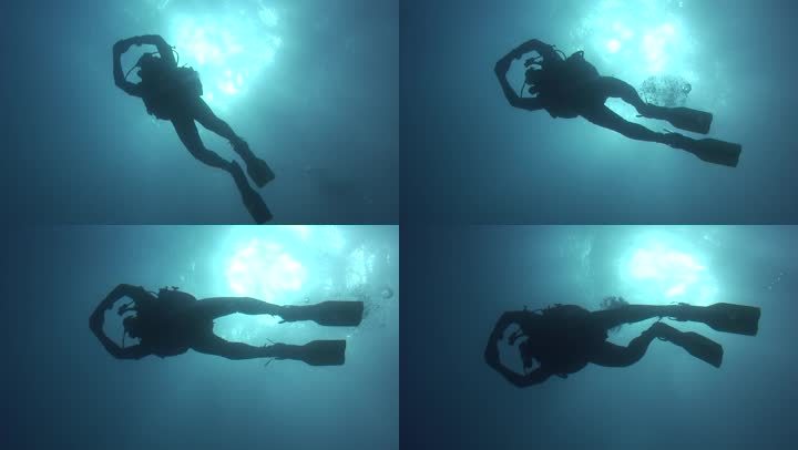潜水员在水中缓慢而放松地移动。