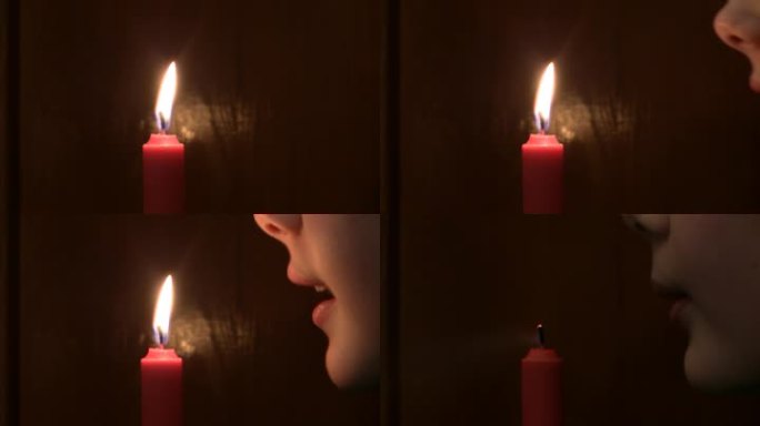 女孩熄灭了燃烧的蜡烛。