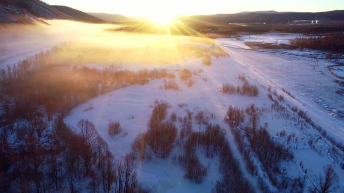 航拍大兴安岭雪野日出