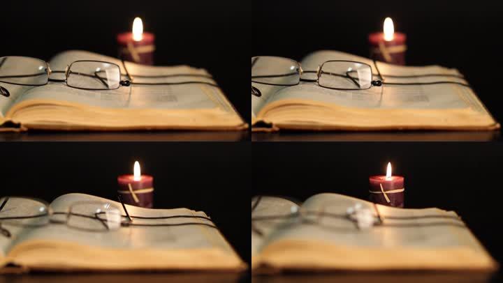 在蜡烛上用眼镜转移焦点。