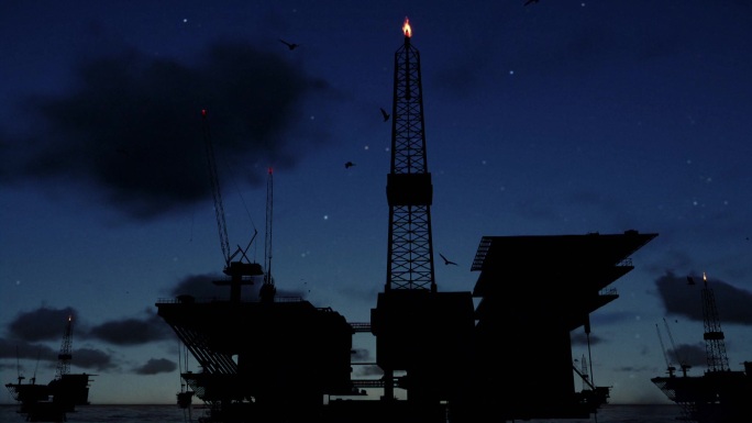 海洋中的石油钻井平台，日夜日出