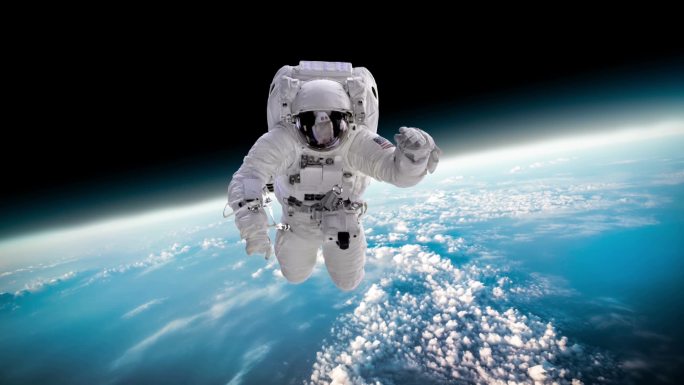 太空人在外太空对地球的背景。这张图片的元素由美国宇航局提供。