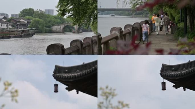 杭州拱宸桥大运河船只过往行人漫步