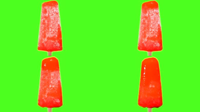 红色冰淇淋在绿色背景上融化