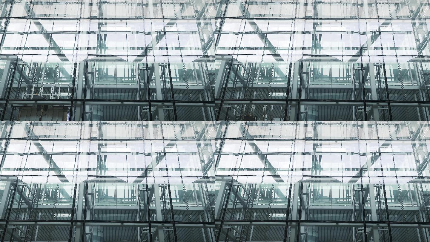 现代玻璃幕墙办公大楼观光电梯