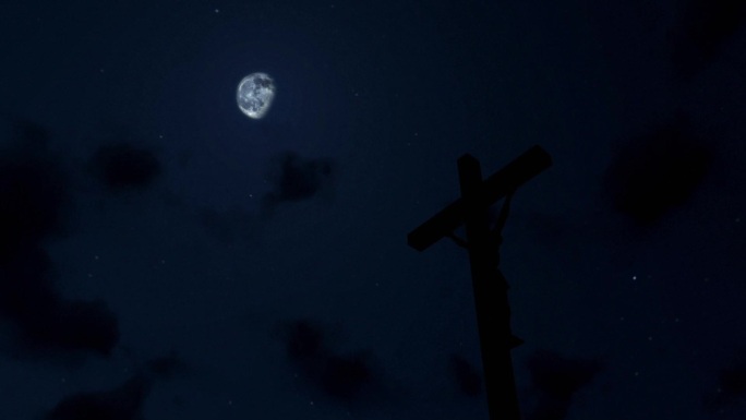 耶稣在十字架上，夜幕降临