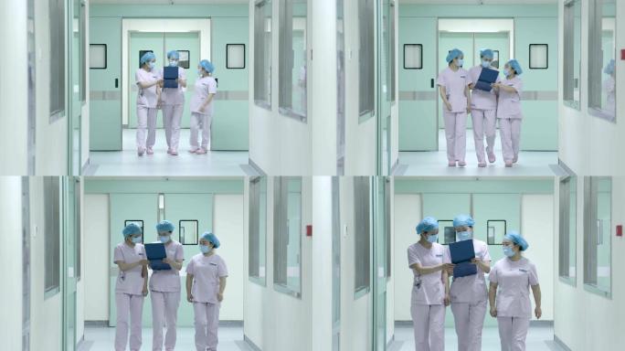 医院走廊医生护士交流讨论病情