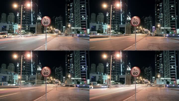 迪拜码头的夜间街道时间流逝。高清视频。