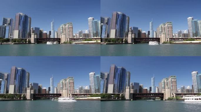 多利从水中拍摄了芝加哥天际线的平滑照片，船进出芝加哥河