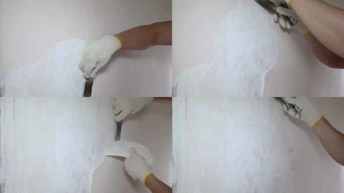 男子用工具移除旧墙纸