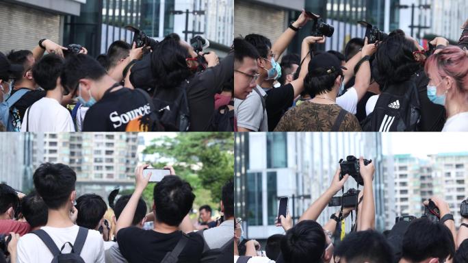 记者摄影师拍照