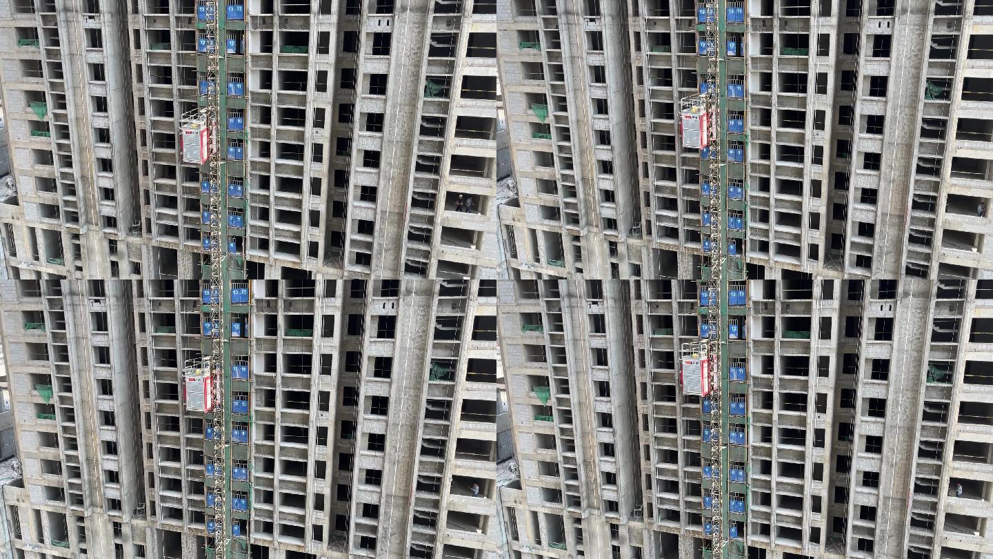 俯视建筑工地施工电梯高楼大厦钢筋混凝土