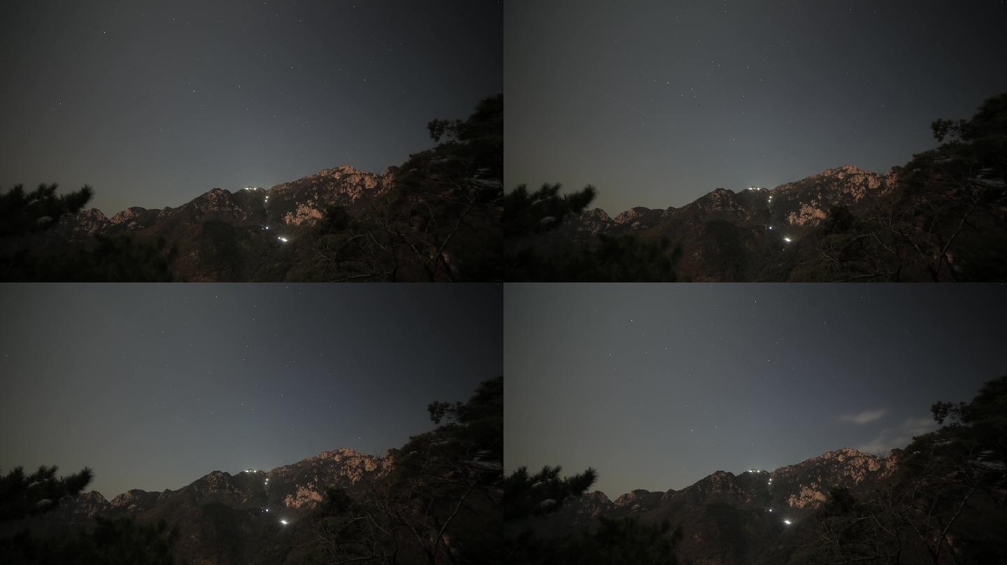 夜晚星空下的泰山延时摄影