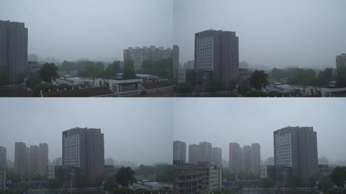 阴天雨雾下雨中的城市楼房