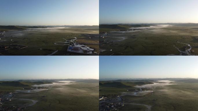 诺尔盖县城清晨日出晨雾航拍