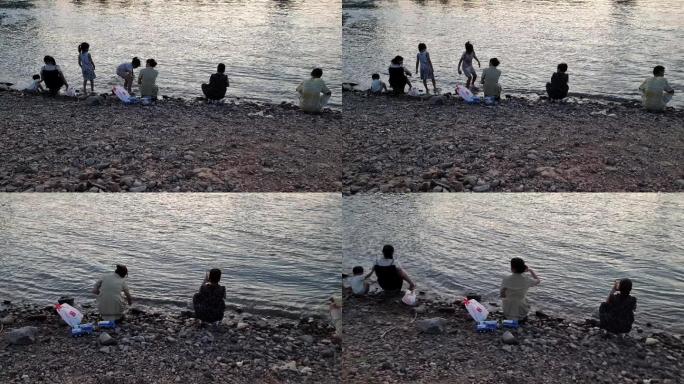 在江边玩耍的画面河边玩水防溺水宣传素材