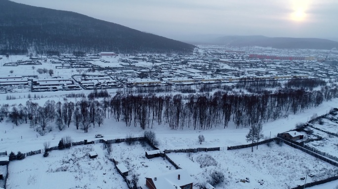 航拍大兴安岭山村雪景