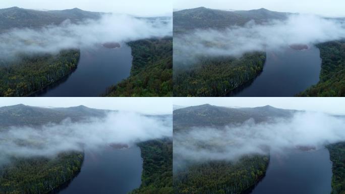 航拍下雨时山林河湾云雾