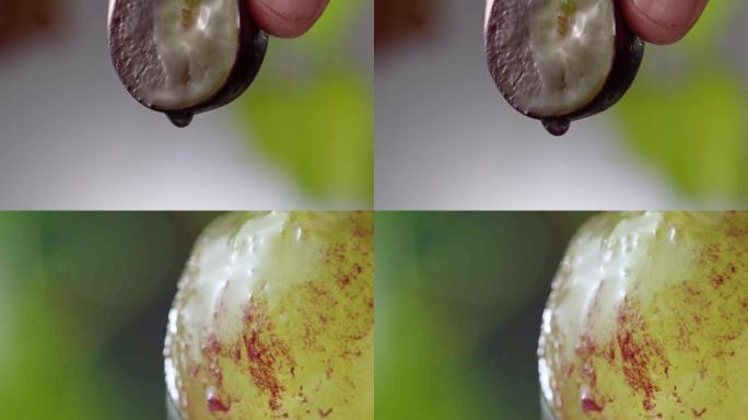 葡萄挤出汁水 汁水滴落在葡萄上
