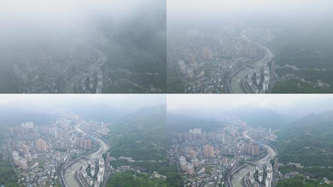 云雾下穿梭城市航拍