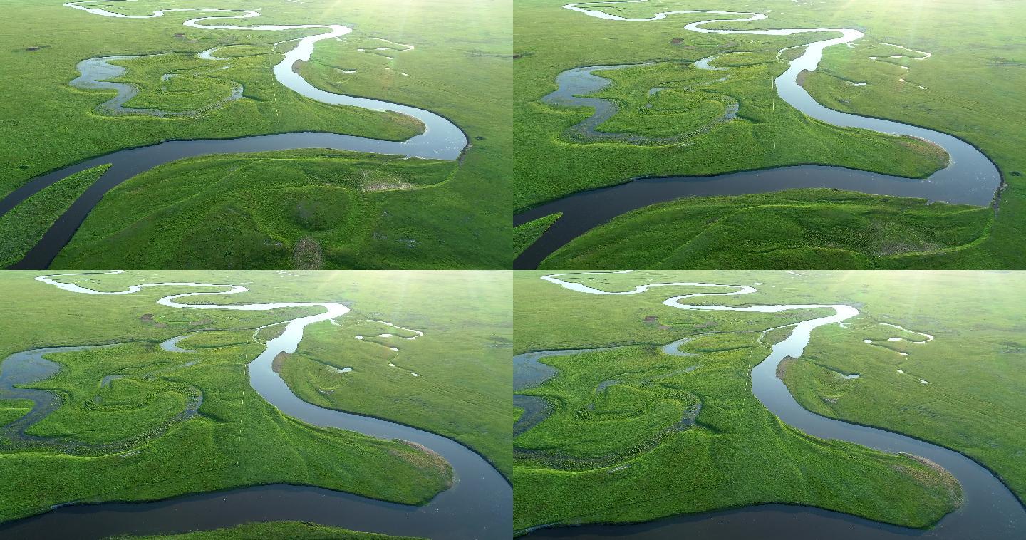 航拍绿色草原蓝色河湾