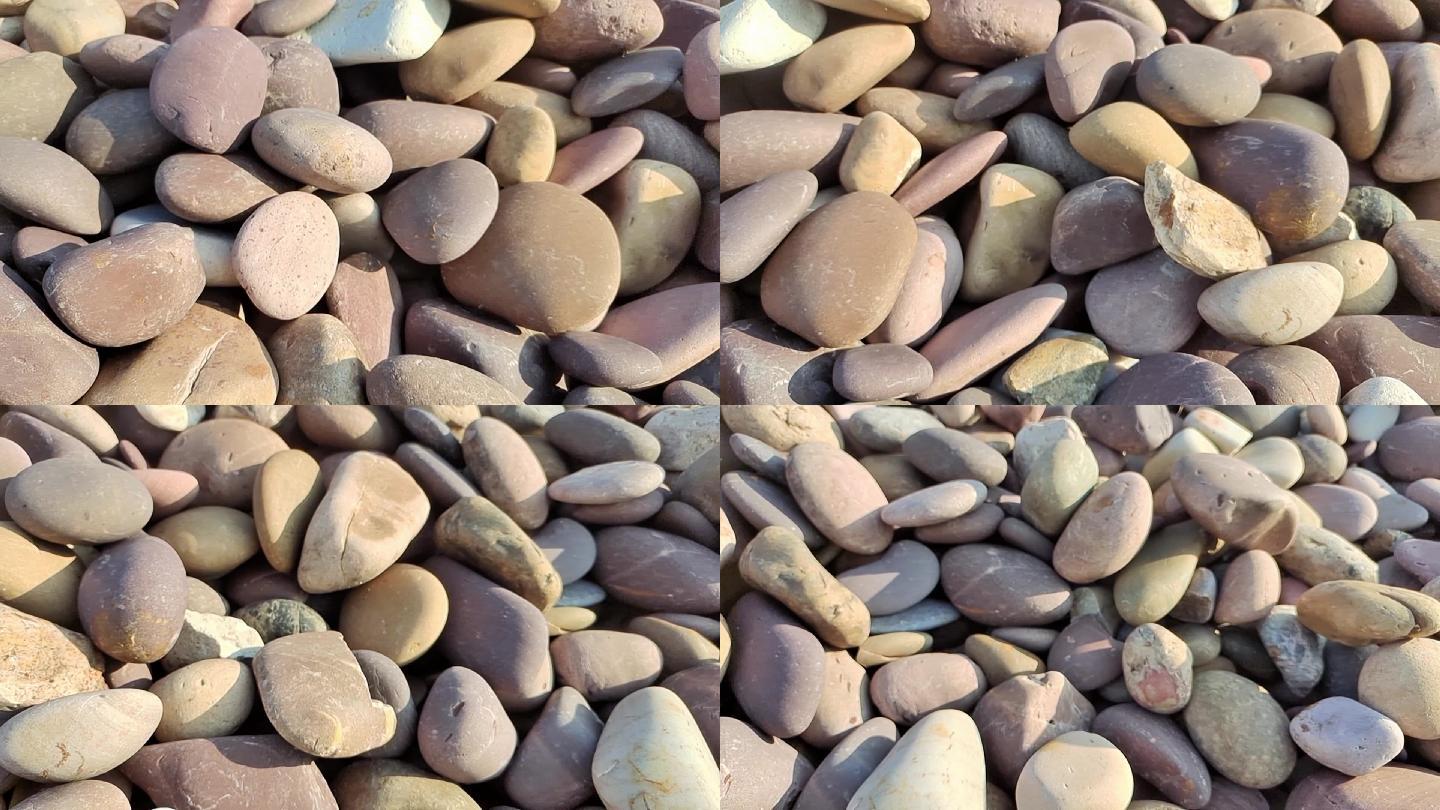 小圆石光滑的鹅卵石清晨晨光照圆石唯美圆石