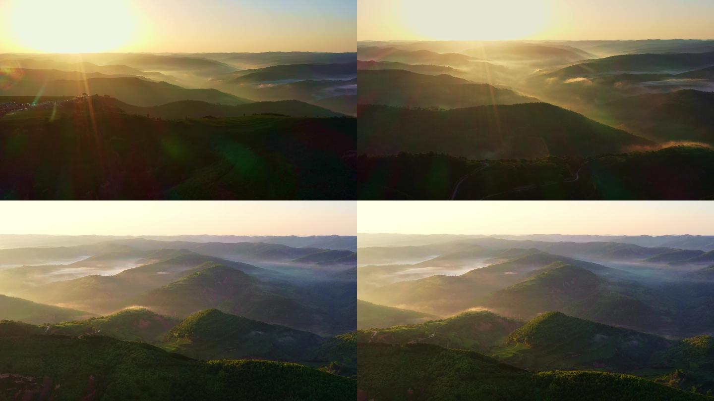 清晨如画的日出，云雾在山谷中缭绕