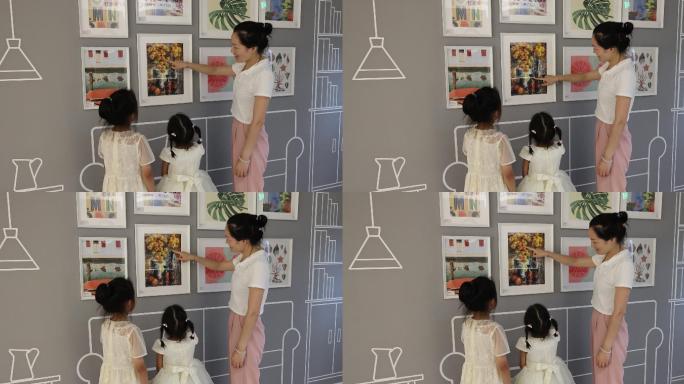 实拍4k妈妈带孩子参观画展