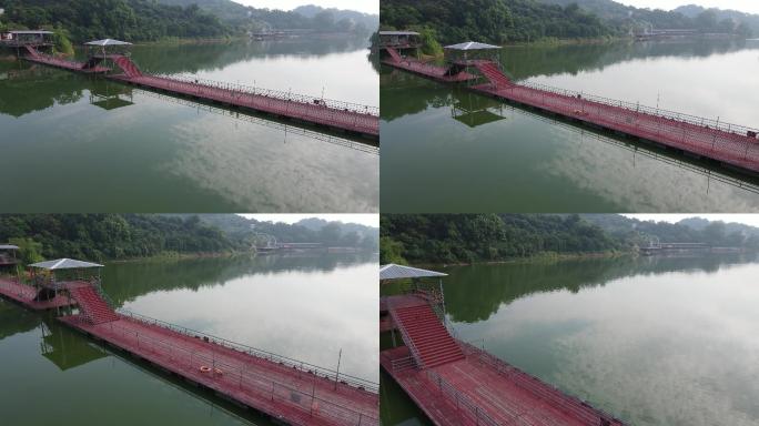 无人机飞越湖面水上浮桥素材