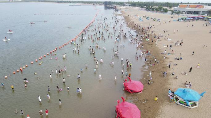 宁波北仑区梅山湾沙滩公园滨海沙滩4K航拍