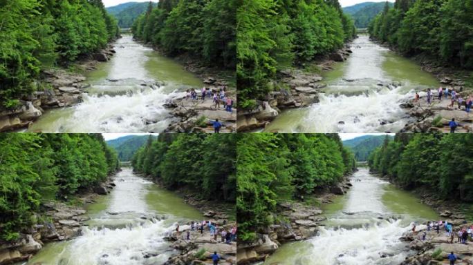 乌克兰喀尔巴阡山脉的亚雷姆切瀑布附近的游客
