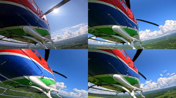 直升机飞越蓝天白云飞机逆光旅游旅行风光