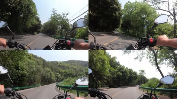摩托车行驶在山间公路上