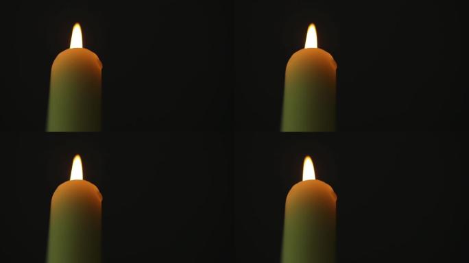 黑暗中燃烧的蜡烛
