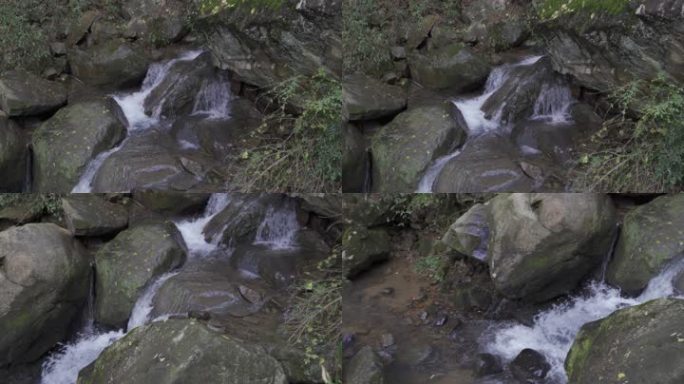 山里石缝中的小溪泉水河流山涧